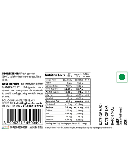 A white rectangular label with printed product information for Big Bear Farms Apricot Jam, nutrition facts, ingredients, and a green circular logo, shown against a black background.