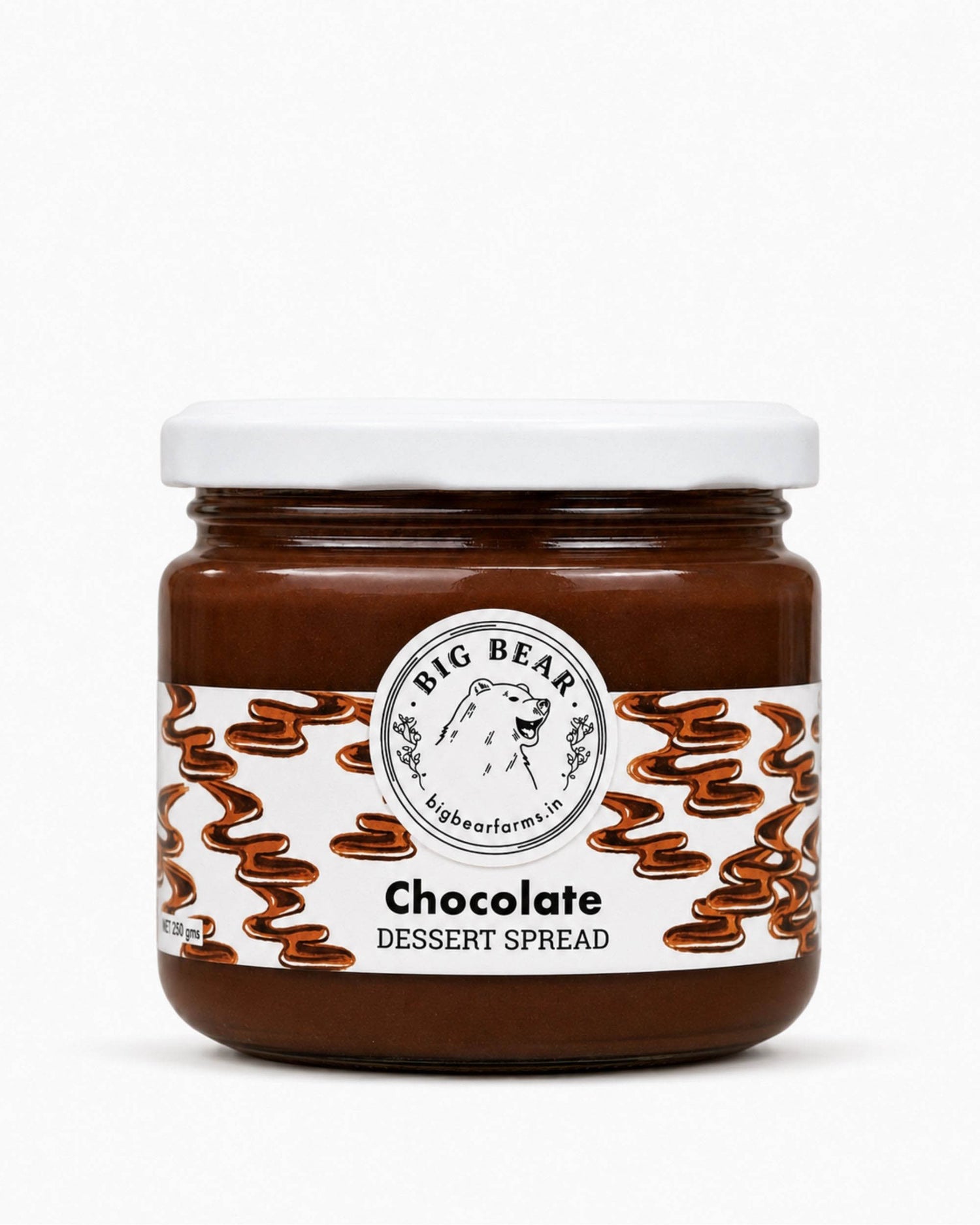 A jar of Big Bear Farms Chocolate Dessert Spread on a clean white background. The product is in a clear glass jar showing the rich dark brown spread inside, topped with a white lid and a white label featuring the brand logo and chocolate swirl illustrations.