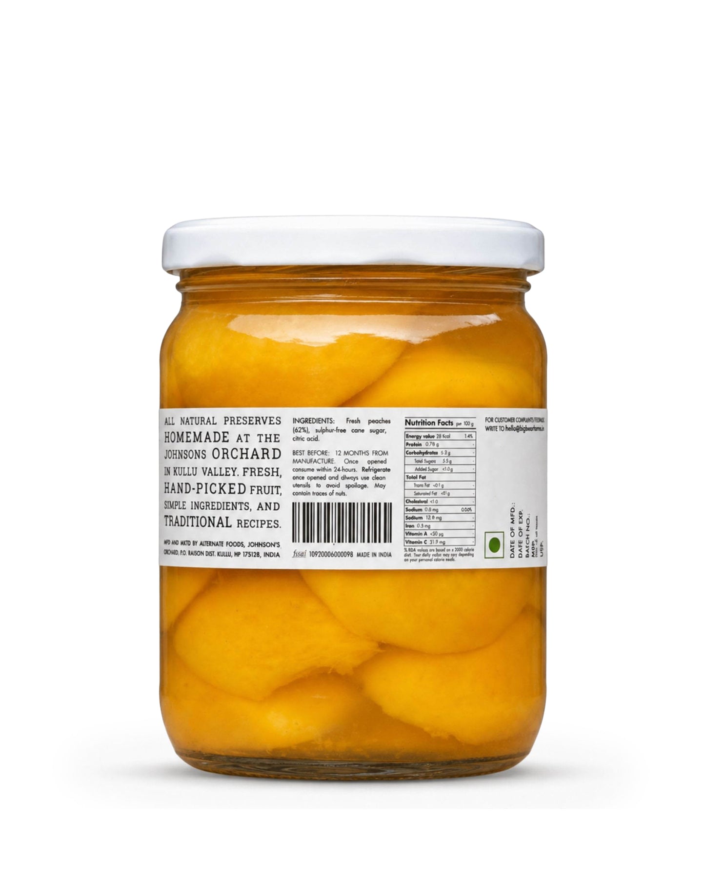 A glass jar of Big Bear Farms sliced peaches in syrup, with a white lid and a white label showing product details and a barcode, set against a plain white background.