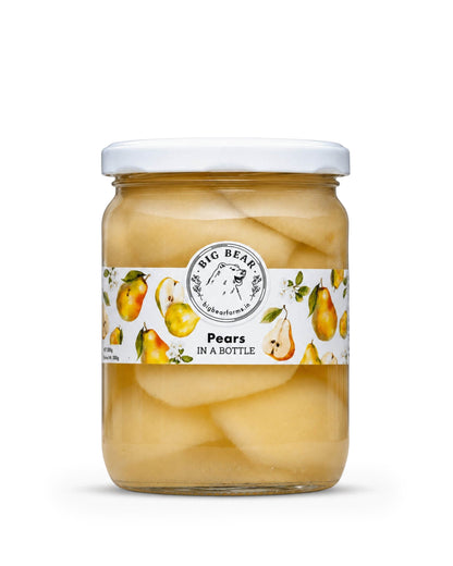 A glass jar of Big Bear Farms Pears in a Bottle in syrup with a white lid and a white label decorated with illustrations of pears, shown on a white background.